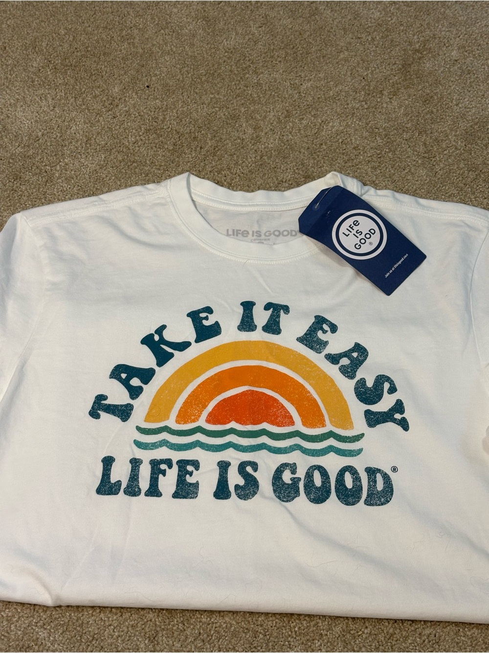 Life Is Good White Tee with Teal Text and Orange-Yellow Retro Sun